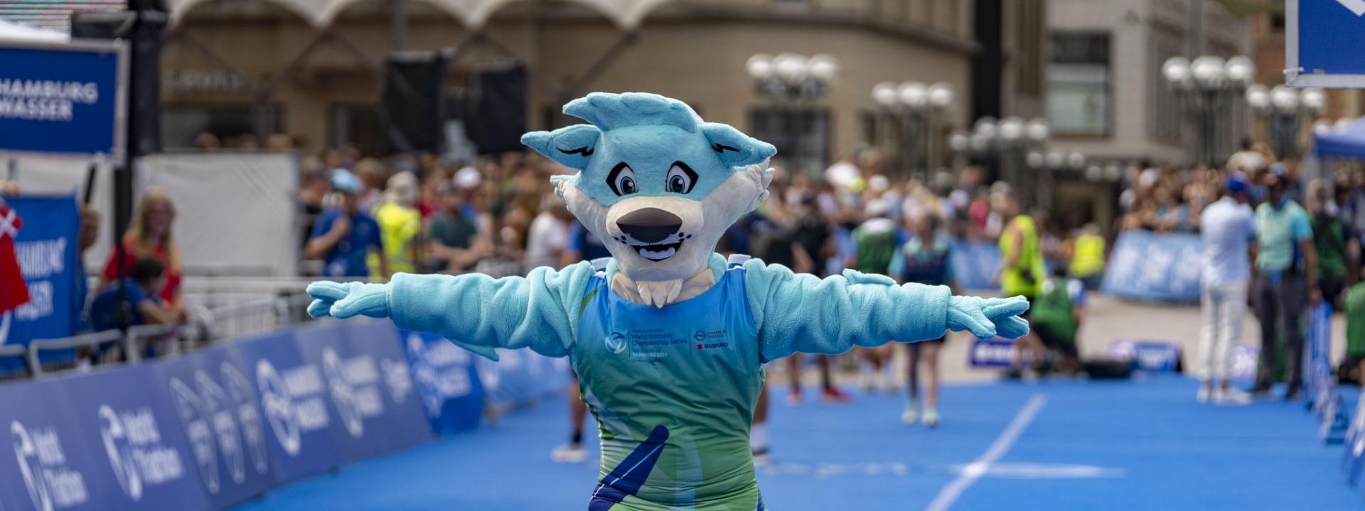 Trinity auf dem blauen Ziel-Teppich